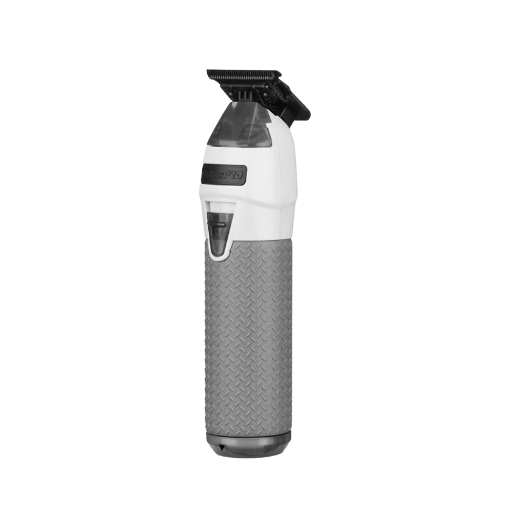 All-metal trimmer with white body, dark clipper head, and textured gray grip.